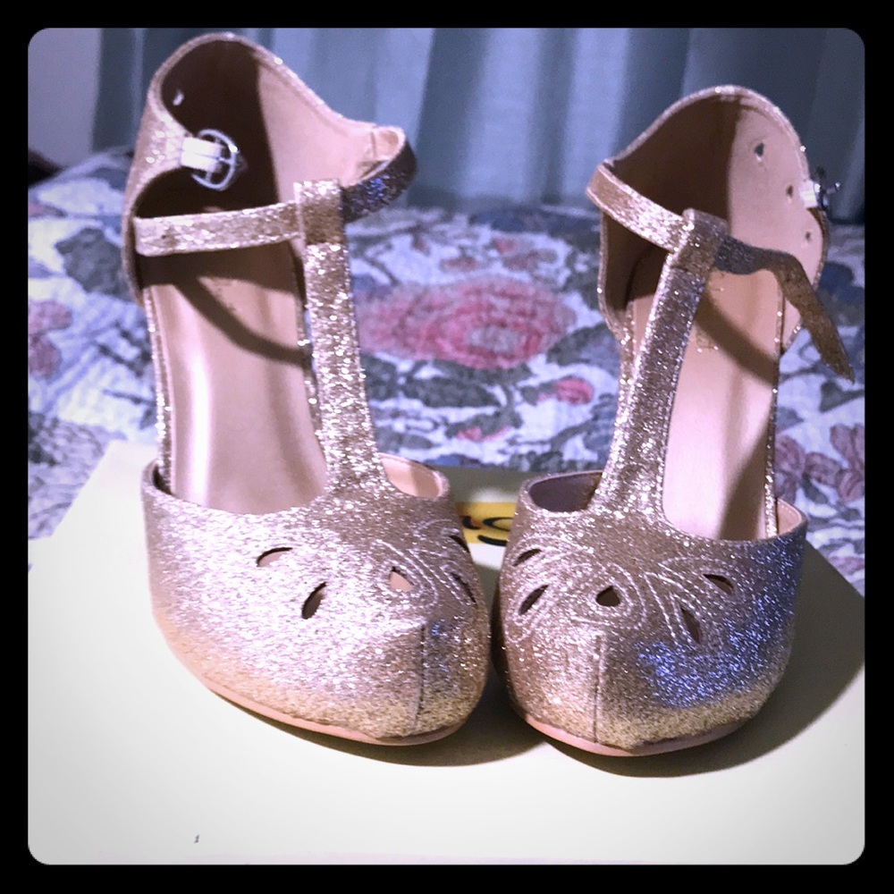 Gold glitter high heel shoes